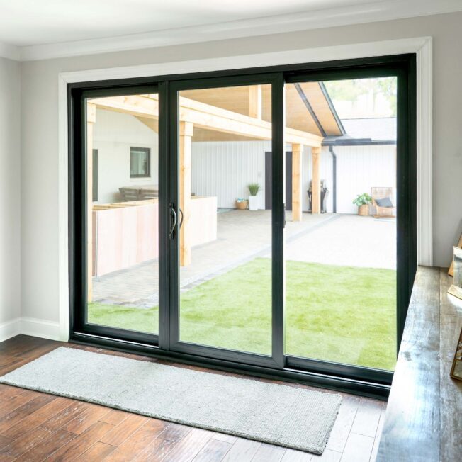 A dark-framed sliding door