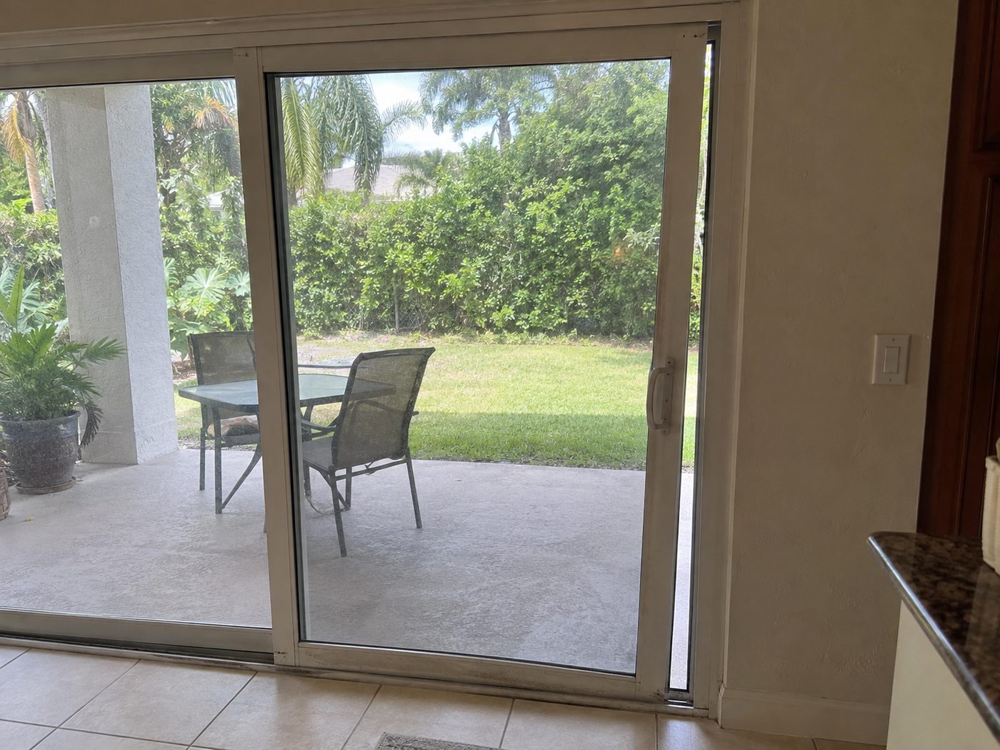 A sliding glass patio door in a Florida home